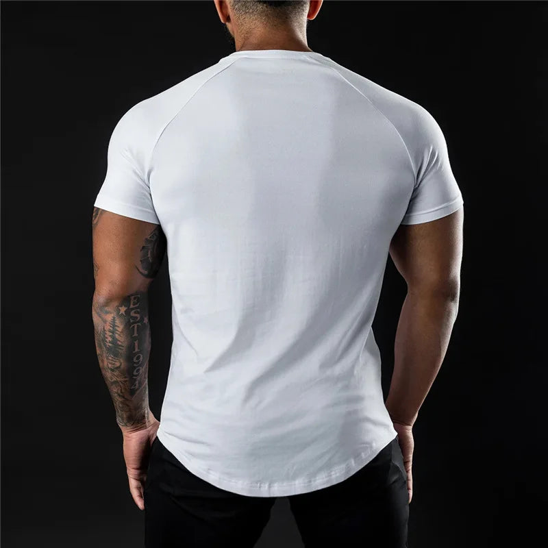 T-shirt de gymnastique uni pour hommes, vêtements de Fitness d'été, col rond, manches courtes, en coton, Slim Fit, musculation, entraînement