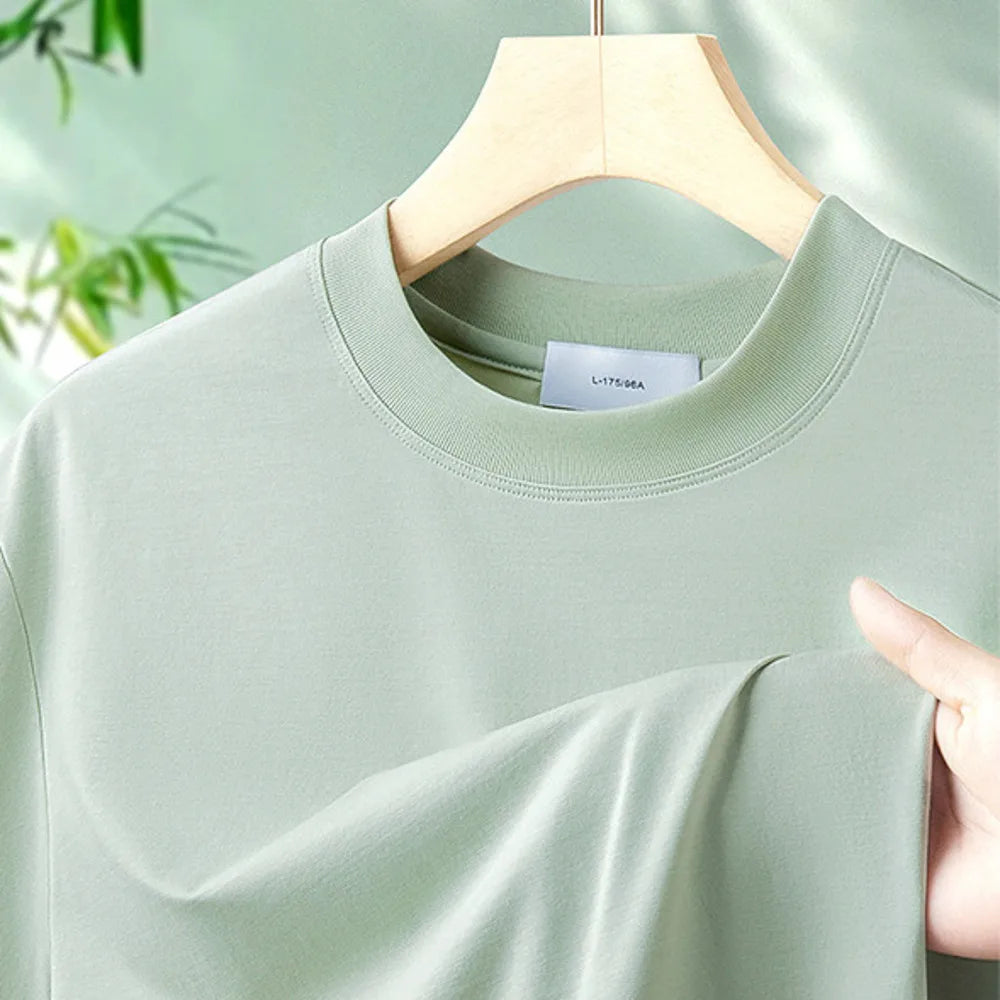 Fibre de bambou antibactérienne classe A Cool pour hommes à manches courtes 2025 nouveau T-Shirt haut de gamme polyvalent de couleur unie respectueux de la peau
